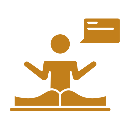 Person gesturing while speaking, with an open book in front.